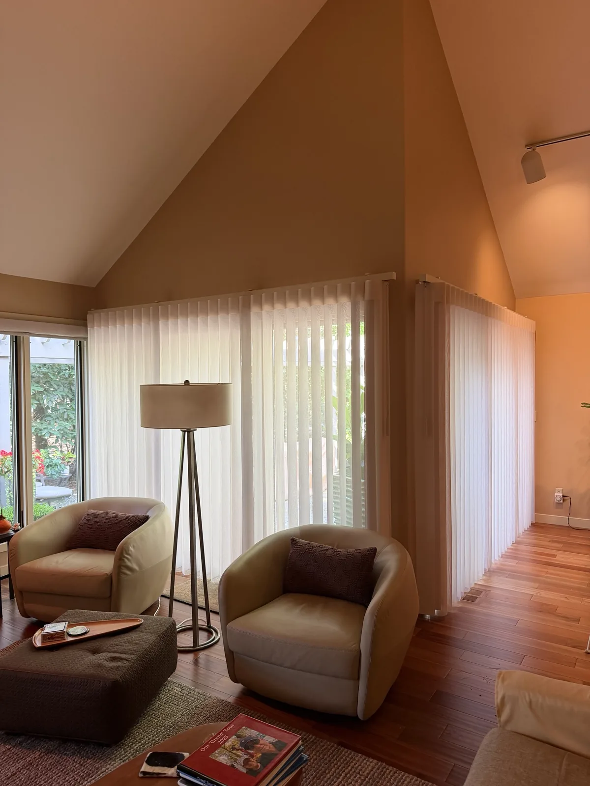 Sheer vertical shades installed in a vaulted Dublin living room