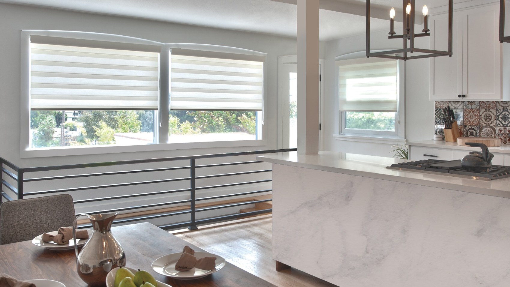 Sheer roller shades in a kitchen and dining area