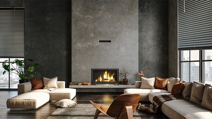 Black sheer vertical drapes in a moody living room with a city view
