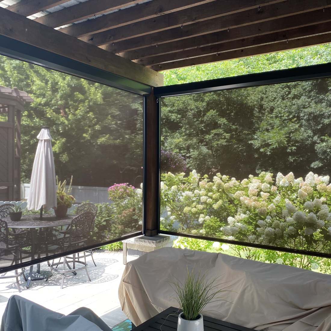 Exterior shading screens on a patio pergola