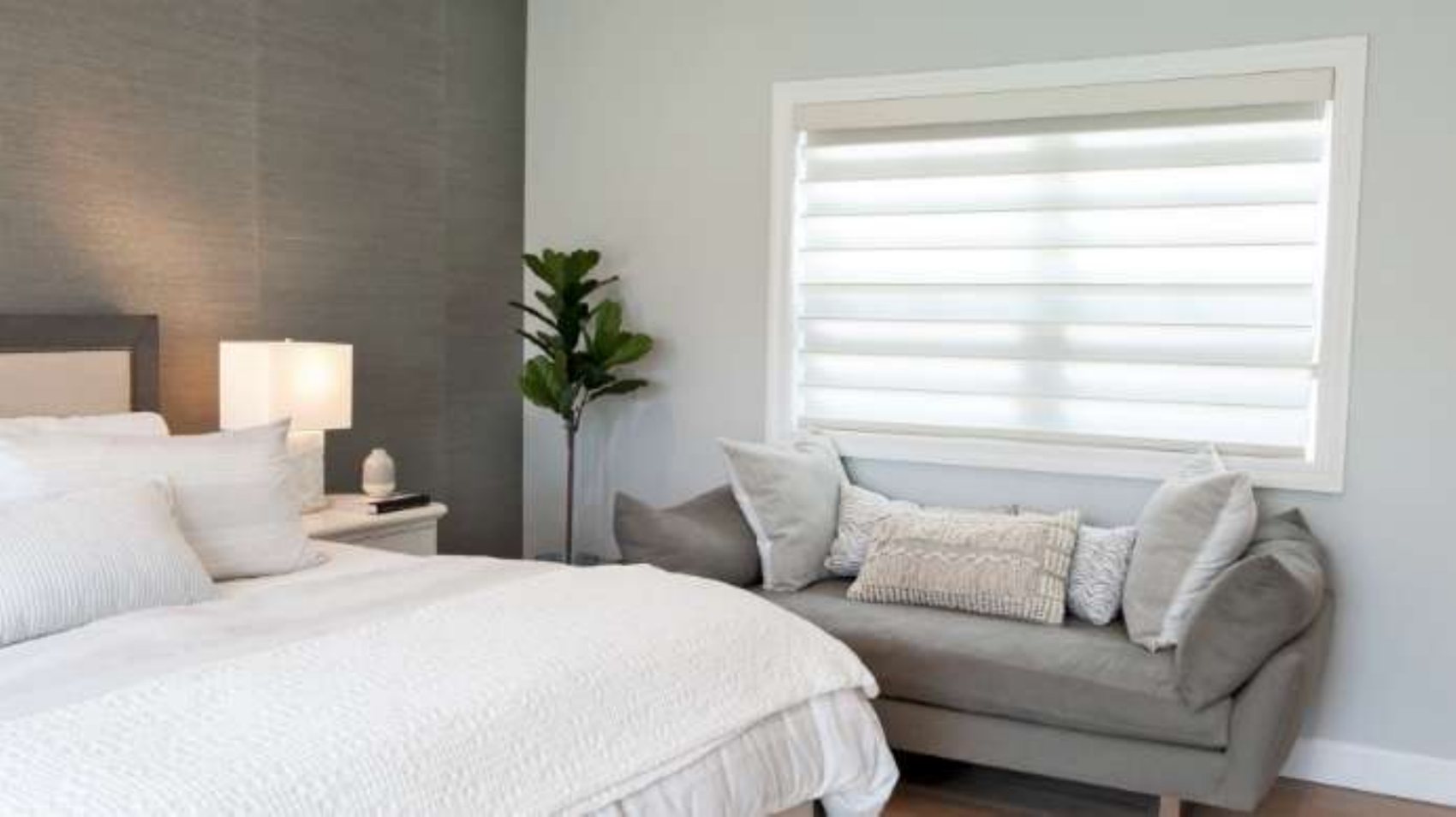 Zebra shades in a bedroom