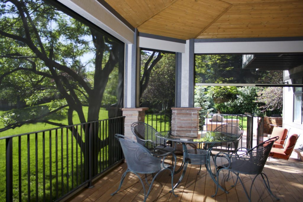 InsolRoll Oasis patio shades on a screened porch