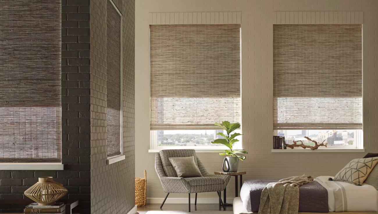 Woven wood shades in a bedroom